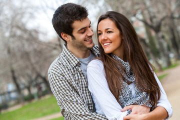 Fototapeta premium Handsome couple in park.
