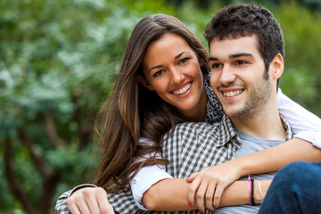 Young couple in park.