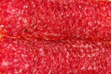 Tasty salami close-up background