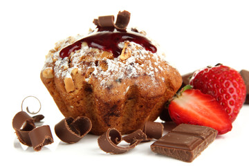Tasty muffin cake with strawberries and chocolate, isolated