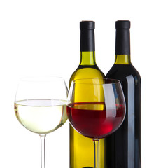 Glasses of wine with bottles isolated on white