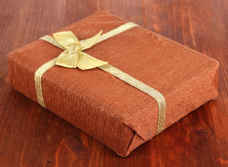 Romantic parcel on wooden background