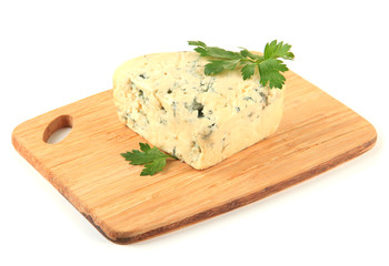 Tasty blue cheese on cutting board, isolated on white