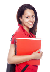 Fototapeta premium Happy female architecture student carrying notebooks - isolated