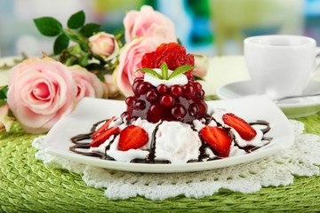 Tasty jelly dessert with fresh berries, on bright background
