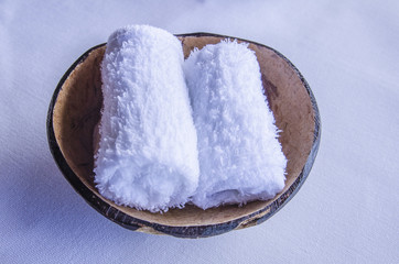 small towel in coconut shell