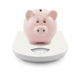 Piggy bank on scales