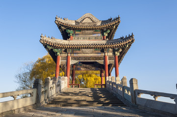 Naklejka premium Willow bridge in Xidi of Summer Palace, Beijing
