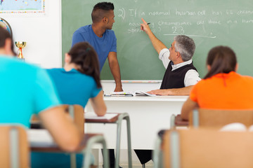 high school biology teacher teaching student