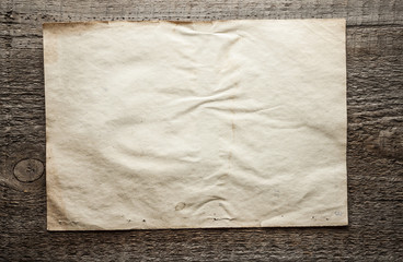 paper on wooden background