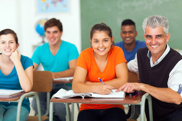 high school teacher with group of students