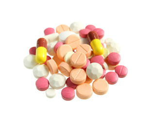 Pile of various pills isolated on white background