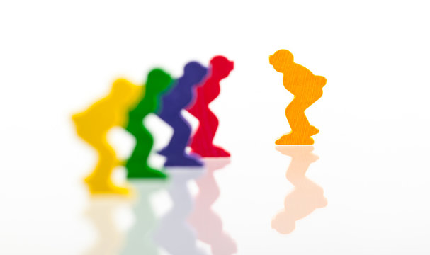 Five colored pawns isolated on a white background