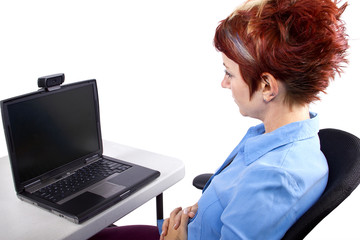 young woman on computer with webcam