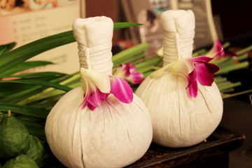 Luk Pra Kob is a traditional herbal massage - obrazy, fototapety, plakaty