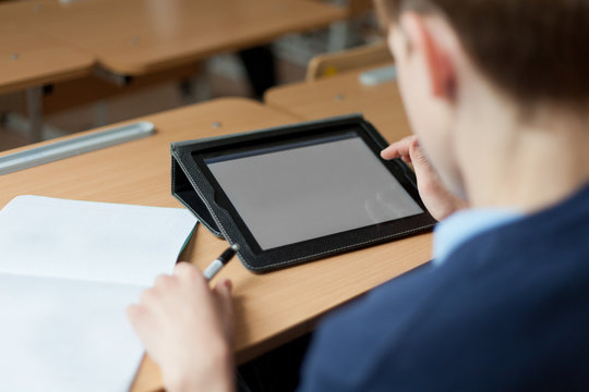 Student And Tablet In Classroom