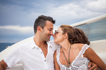 picture of happy young couple on a yacht