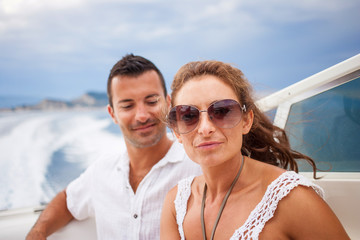 picture of happy young couple on a yacht