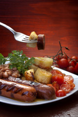 Sausage,  potato and  tomato