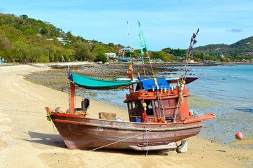Fototapeta premium Wooden fishing boat on the beach