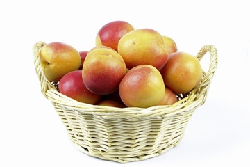 apricots in the basket on the White background