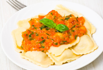 ravioli with tomato sauce and basil
