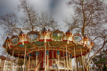 beautiful carousel with ancient drawings and decorations
