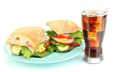 Tasty ham sandwich and glass of cola with ice isolated on white