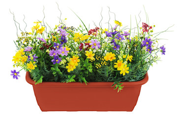 Fototapeta na wymiar Composition of artificial garden flowers in brown flowerpot isol