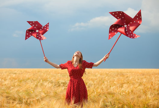 Redhead Girl With Toy Wind Turbine