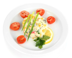Small portion of food on big plate isolated on white