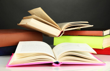 Stack of books on gray background