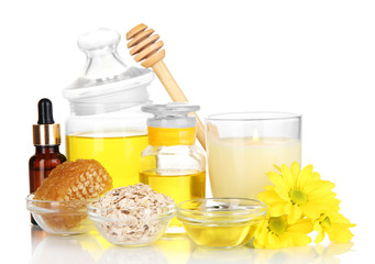 Fragrant honey spa with oils and honey isolated on white