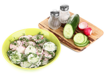 Vitamin vegetable salad in plate isolated on white