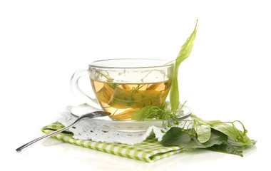 Glass cup of tea with linden isolated on white
