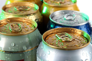 Metal tins on gray background