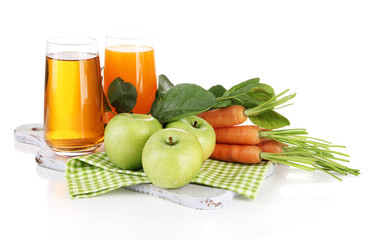 Glasses of juice, apples and carrots, isolated on white