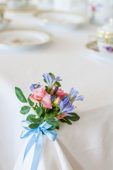 Table decorated with flowers,  decoration for the ceremony.
