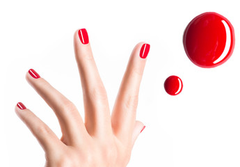 Beautiful female hands with red manicure