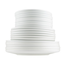 Pile of clean white dish plates isolated