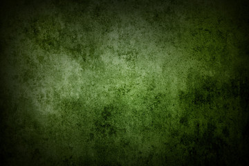 Obraz na płótnie Canvas Green grunge textured stone wall background