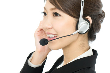 Beautiful asian business operator isolated on white background