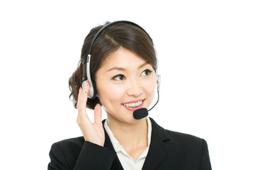 Beautiful asian business operator isolated on white background