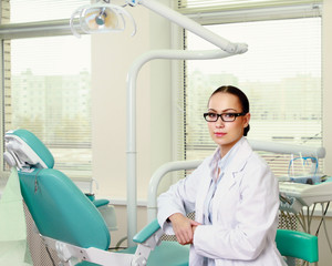 woman dentist at her office