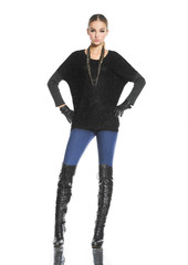 Fototapeta premium beautiful young female in gloves standing posing