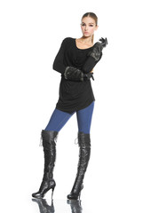 Fototapeta premium young fashion model in gloves posing -full body