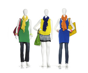 female colorful dress with bag ,scarf on three mannequin