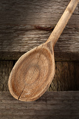 single spoon on shabby table