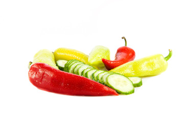chilli and cucumber isolated on white background