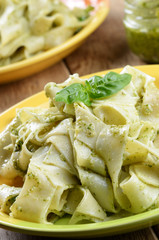 Pasta papardelle with pesto sauce